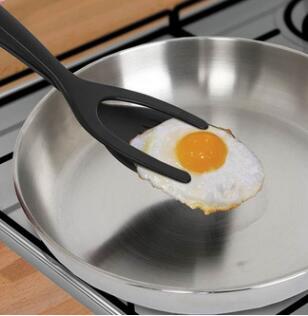 2-in-1 egg spatula and tong clamp.