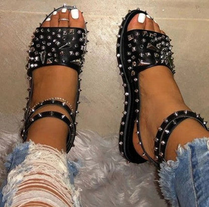 Trendy Roman-style rivet sandals