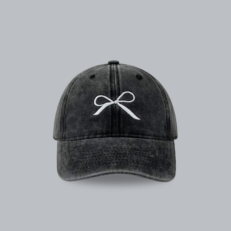 Designer denim peaked cap with bowknot embroidery