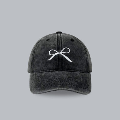 Designer denim peaked cap with bowknot embroidery