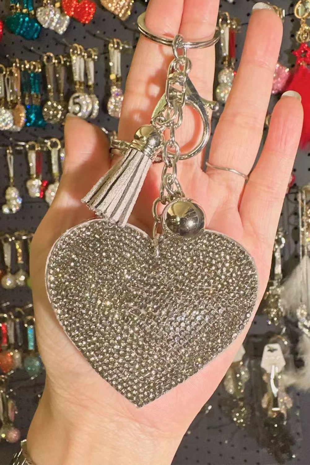 Golden key ring with rhinestone heart.