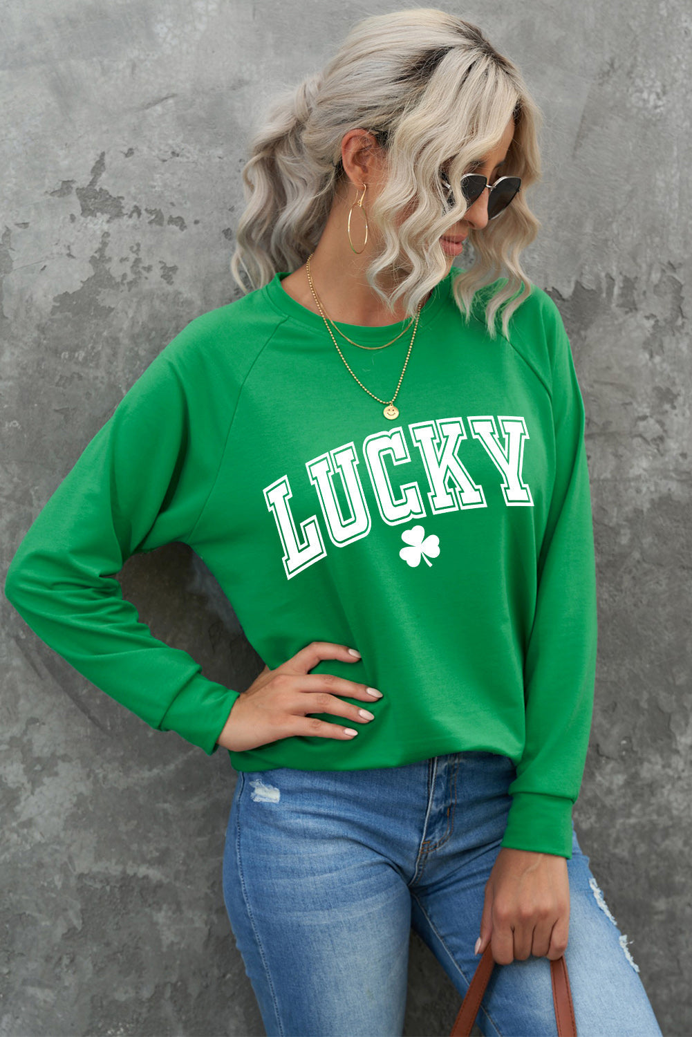 Green raglan sweatshirt with lucky clover