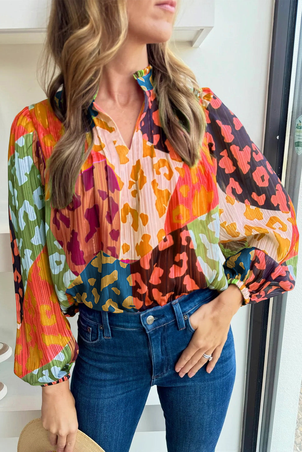 Color block blouse with leopard accents