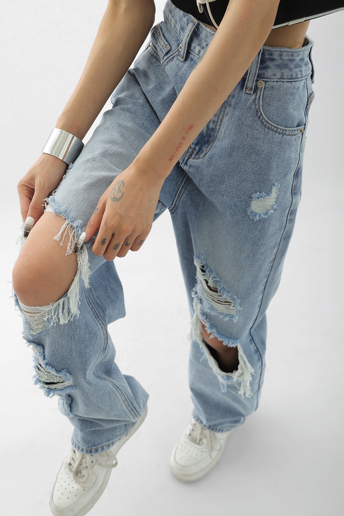 Light Blue Thin Ripped Jeans For Women