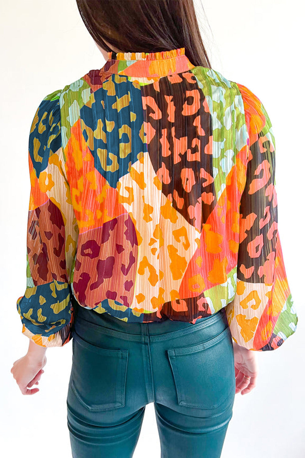 Color block blouse with leopard accents