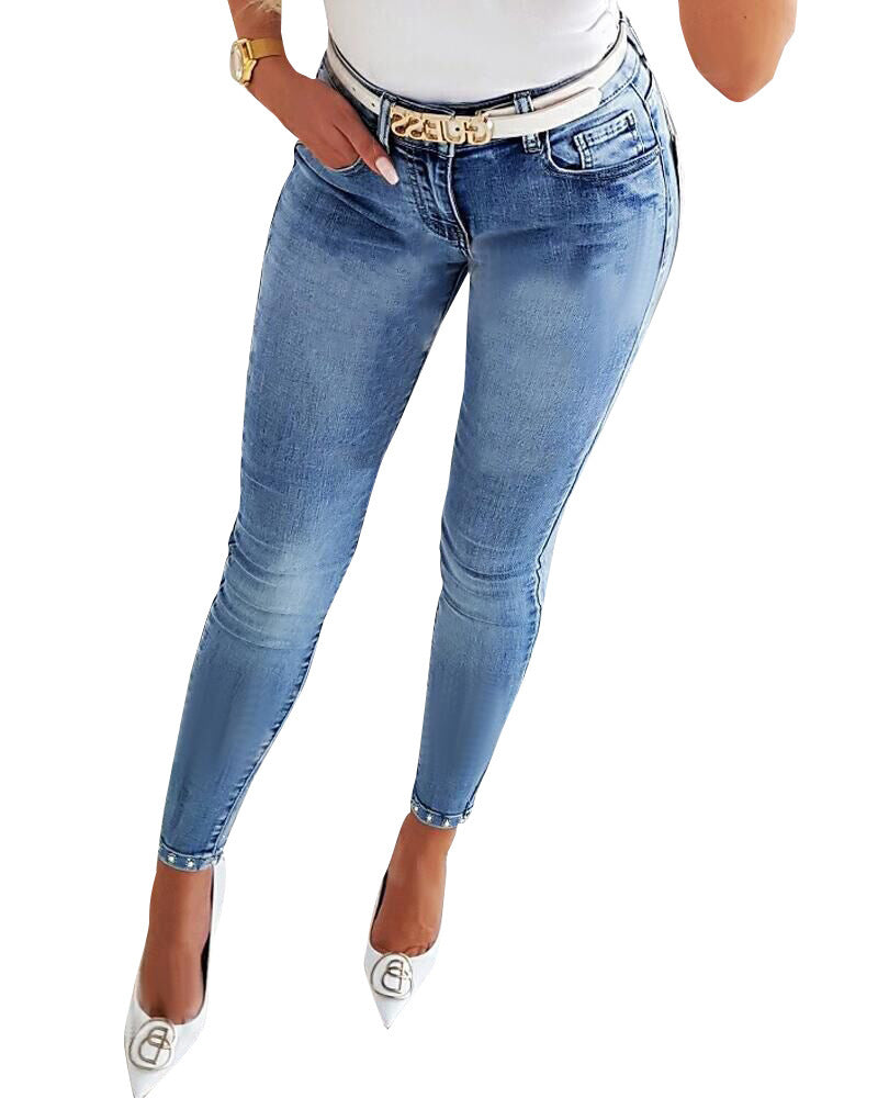 High-waist skinny jeans, European-inspired.