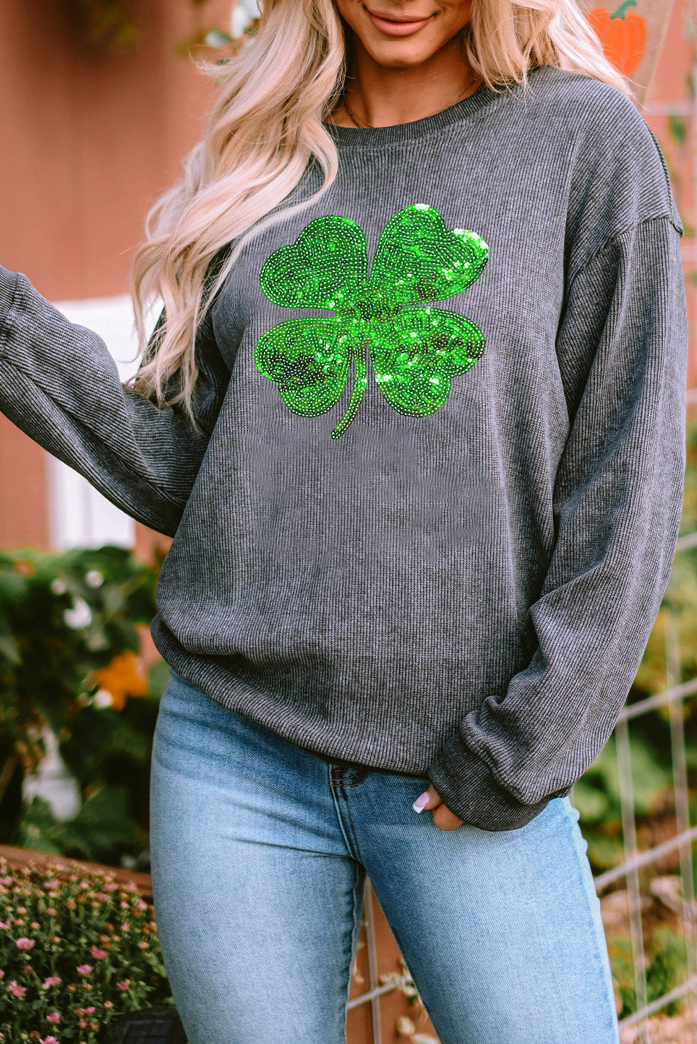 Gray sweatshirt with sequin clover