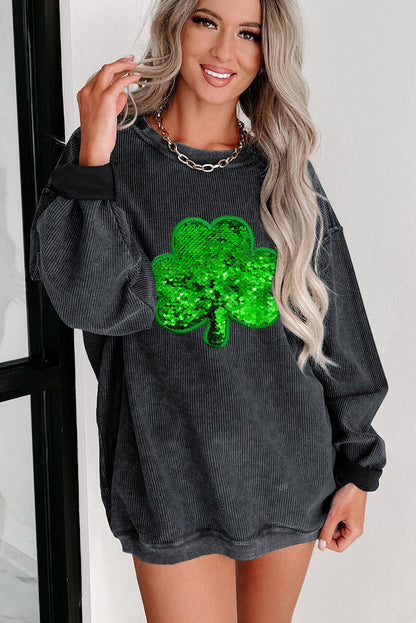 Black sweatshirt with sequin clover