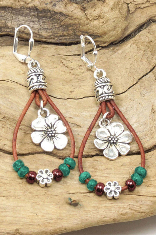 Floral dangle earrings, silvery leather.