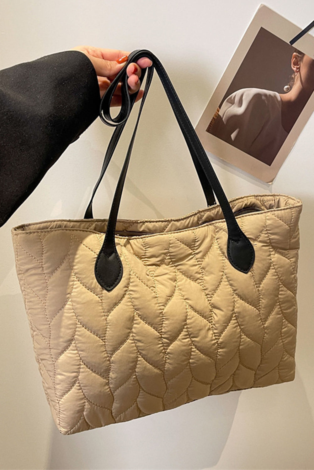 Elegant quilted beige shoulder bag.