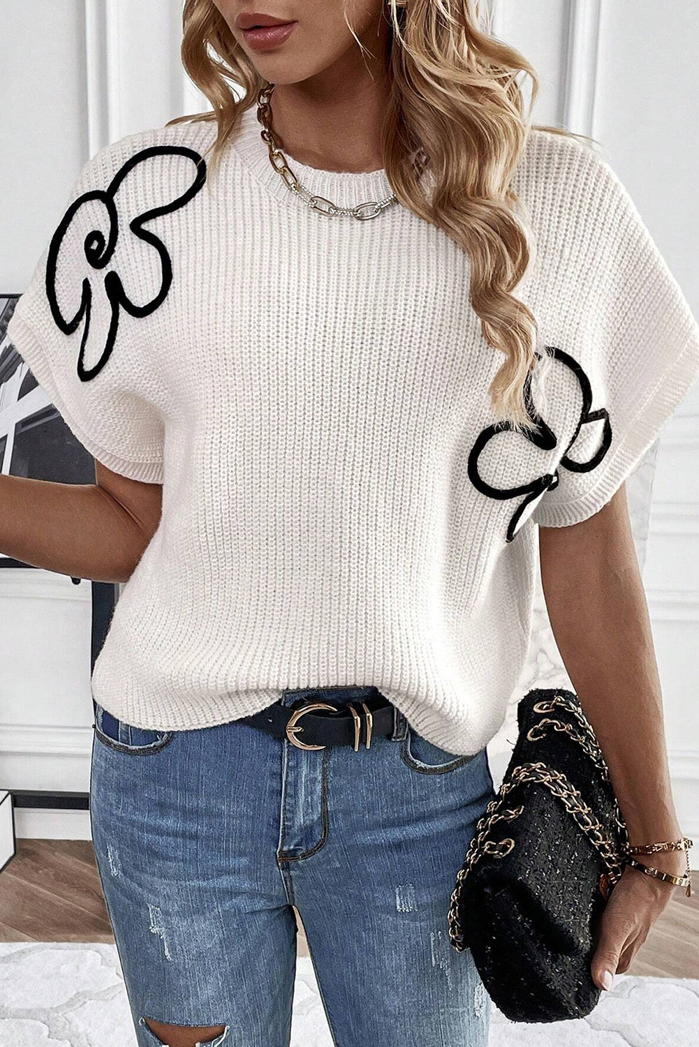 White knitted top with floral pattern