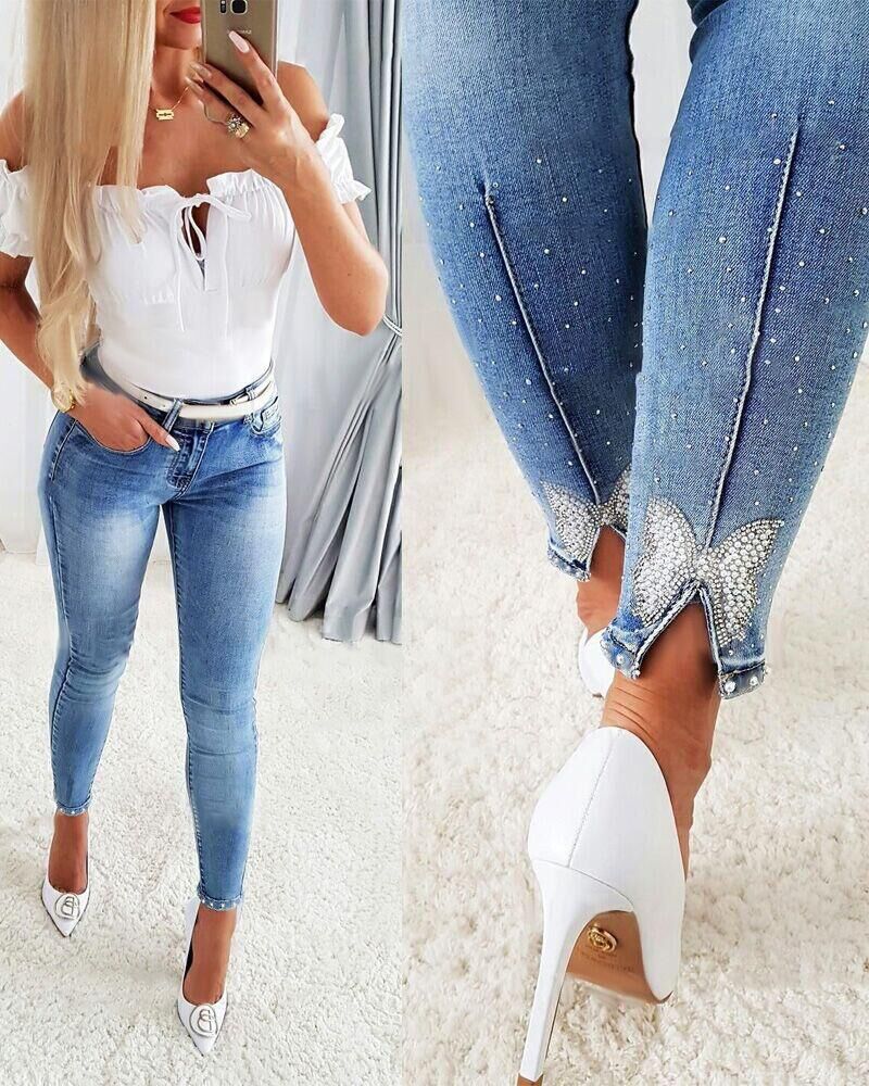 High-waist skinny jeans, European-inspired.