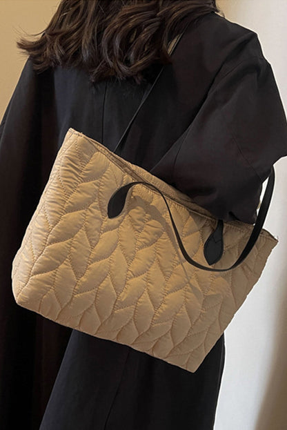 Elegant quilted beige shoulder bag.