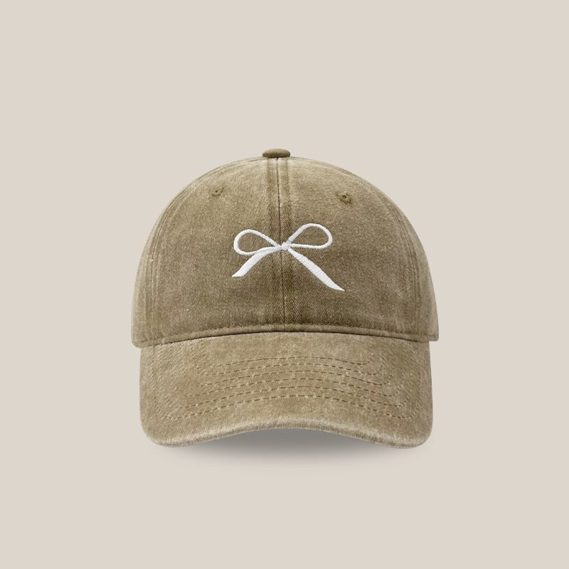 Designer denim peaked cap with bowknot embroidery