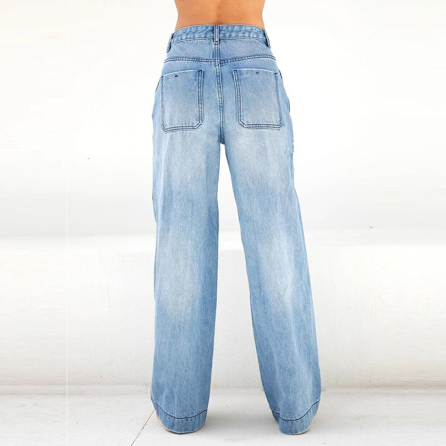 High-waist, loose, wide-leg jeans.