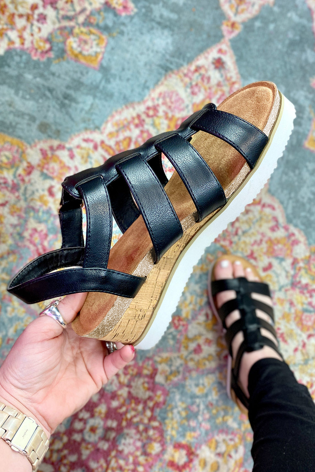 Wedge sandals with sleek straps.