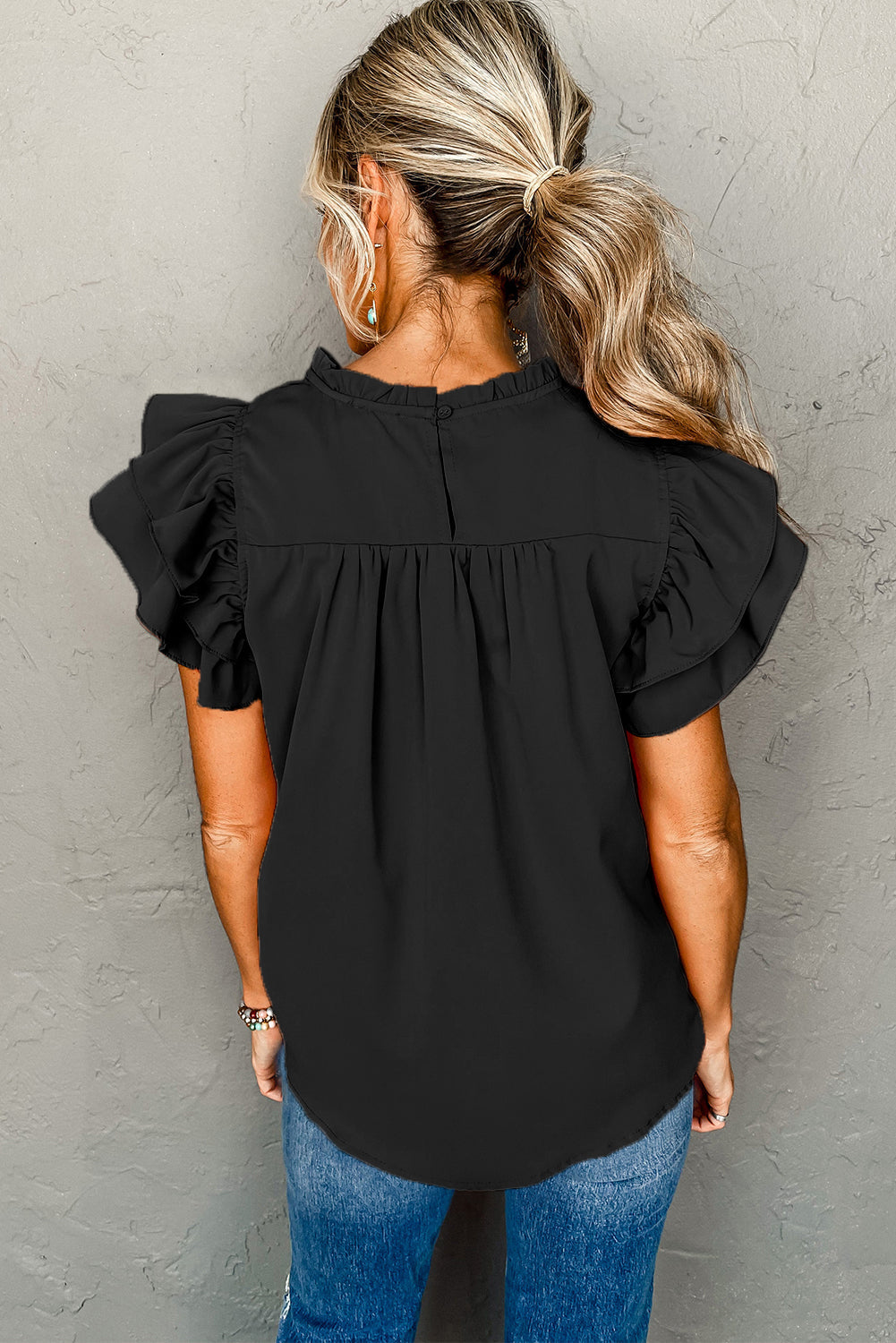 Blouse with ruched, frilled neck