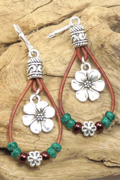 Floral dangle earrings, silvery leather.