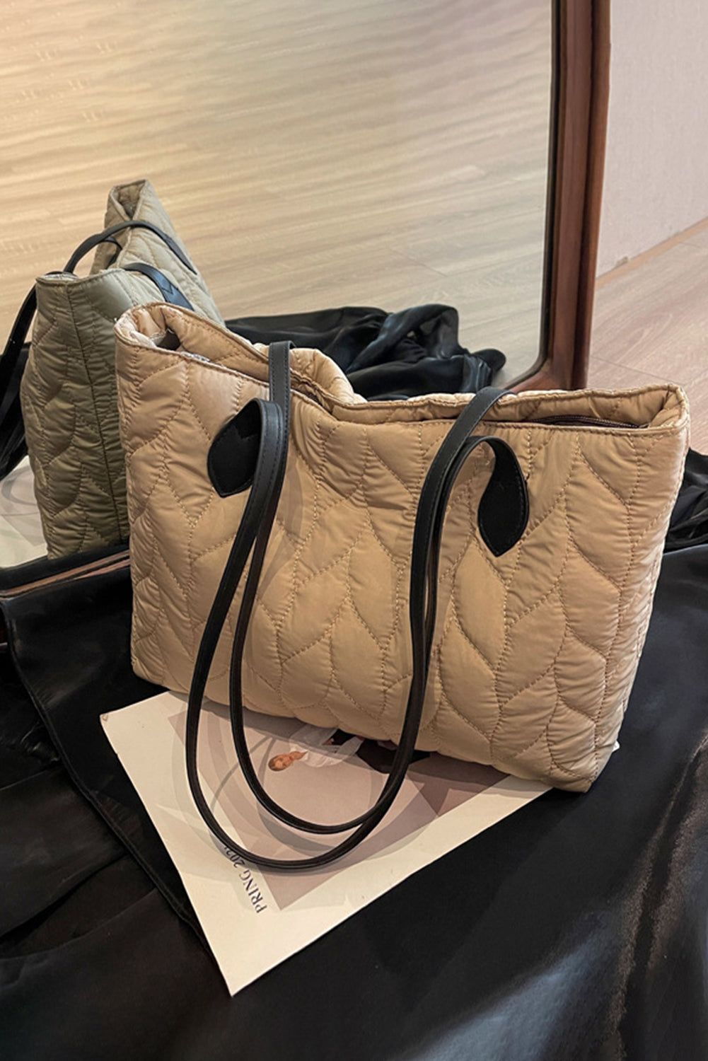 Elegant quilted beige shoulder bag.