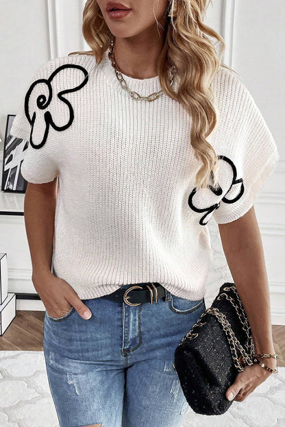 White knitted top with floral pattern