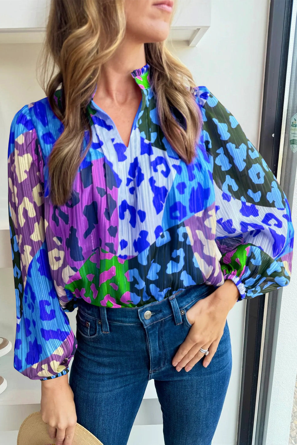 Color block blouse with leopard accents