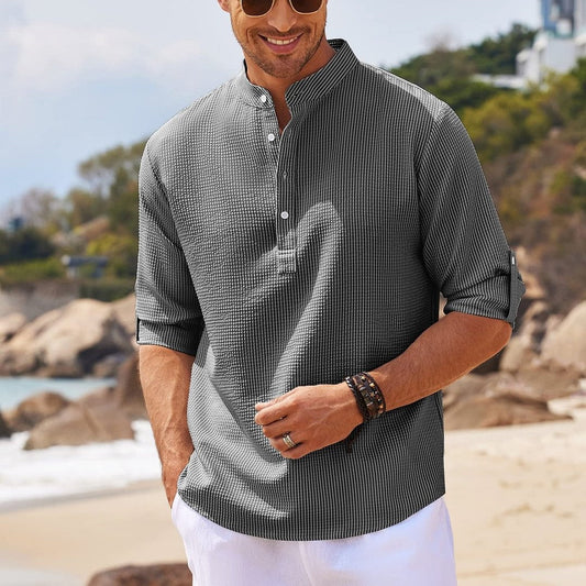 Solid color stand collar shirt.