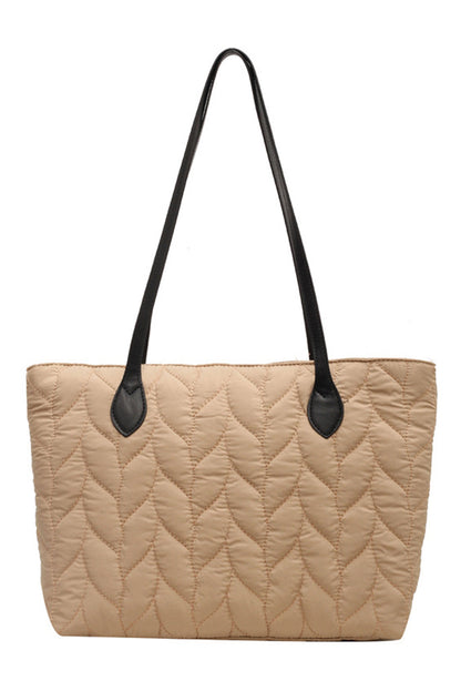 Elegant quilted beige shoulder bag.