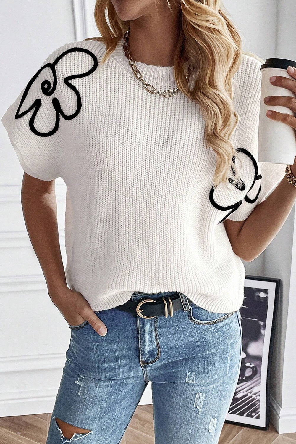 White knitted top with floral pattern