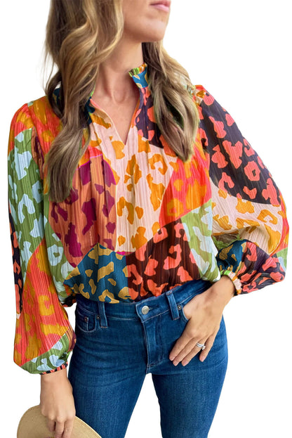 Color block blouse with leopard accents