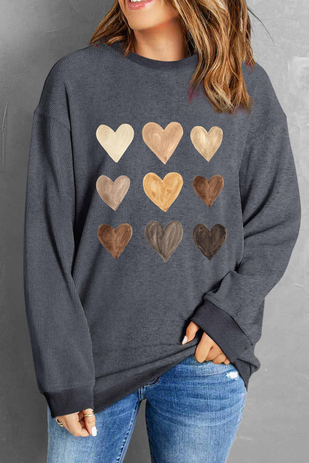 Gray sweatshirt with heart graphic