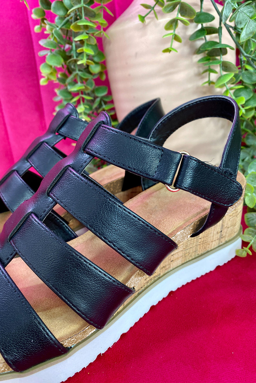 Wedge sandals with sleek straps.